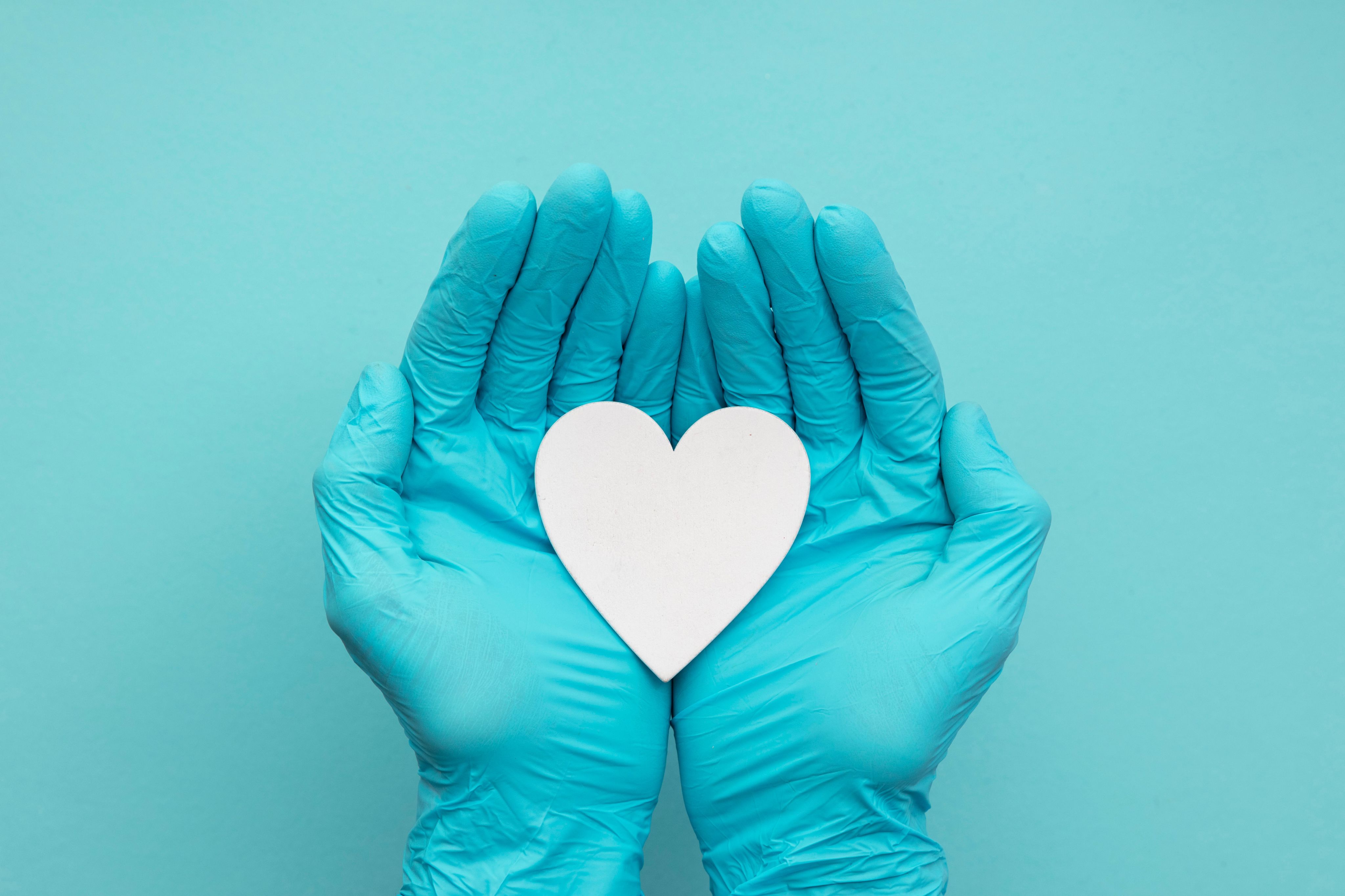 Photo of hands holding heart